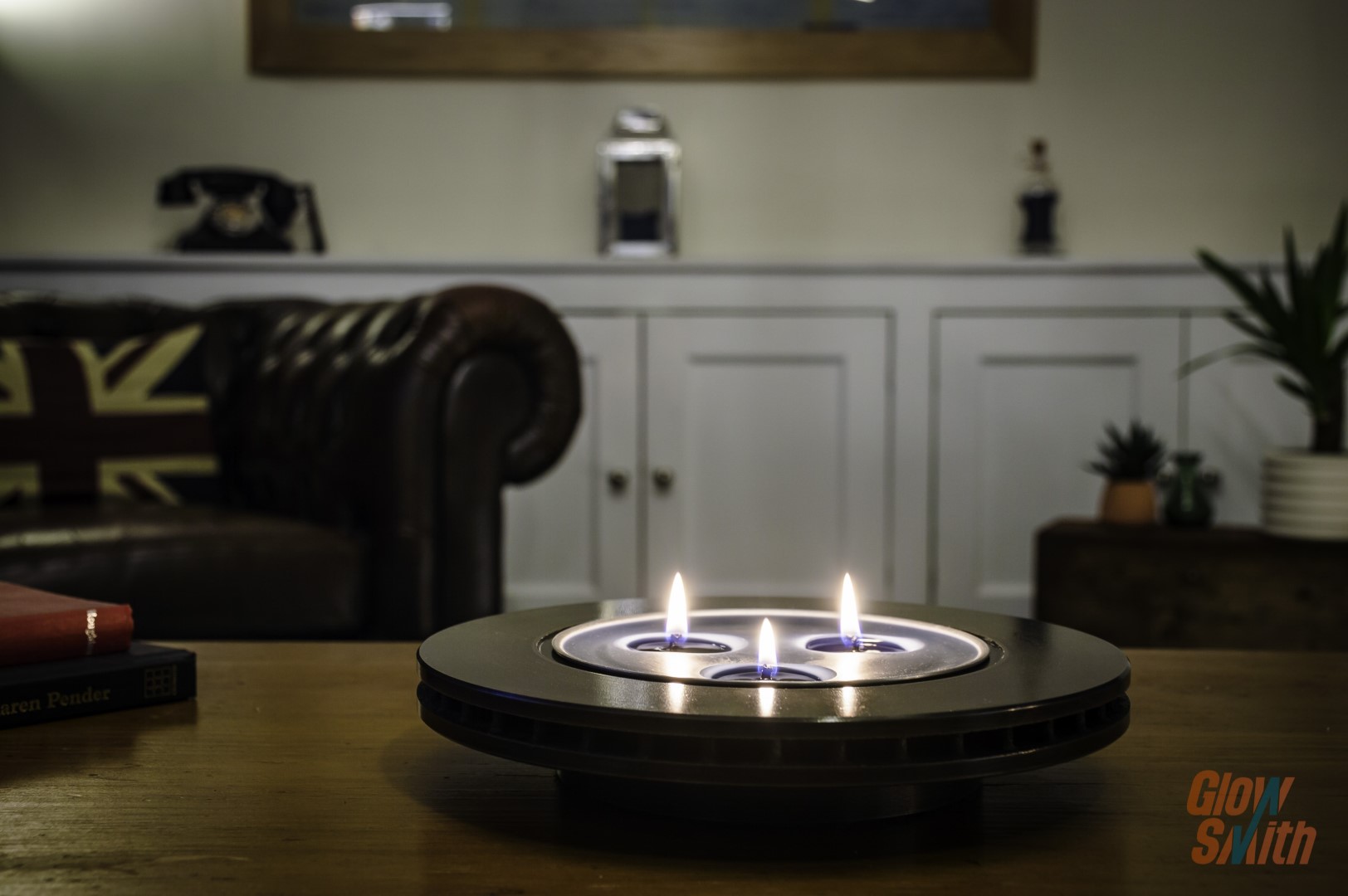 Automotive décor candle holder burning in lounge or study