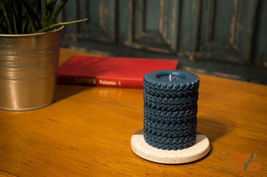 Nordic Pine Tyre Stack candle displayed on a shelf – statement piece, automotive-inspired décor, masculine scented candle