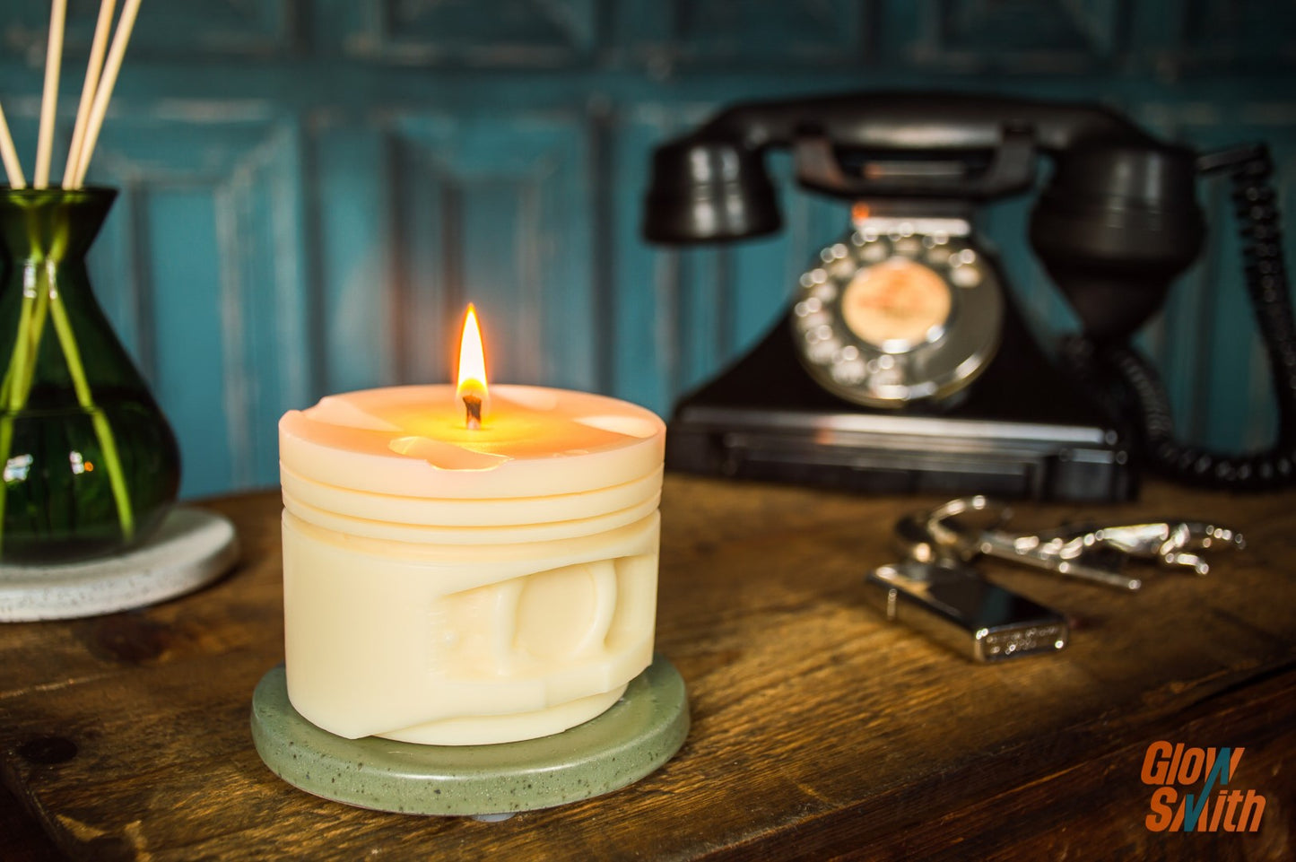 White Fresh Linen Engine Piston Candle burning, showing its white piston design and refreshing fragrance in a masculine man cave setting.