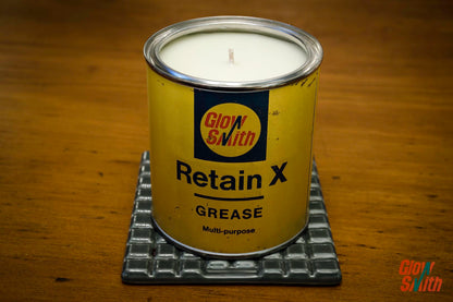 Close-up of the Large 1960s Vintage Grease Tin Candle, showcasing authentic patina and unique design marks for car decor.