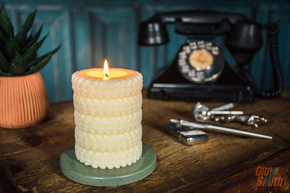 Smoked Vanilla Tyre Stack candle burning in a lounge – ivory sculptural candle, automotive-inspired décor, luxury gift for him