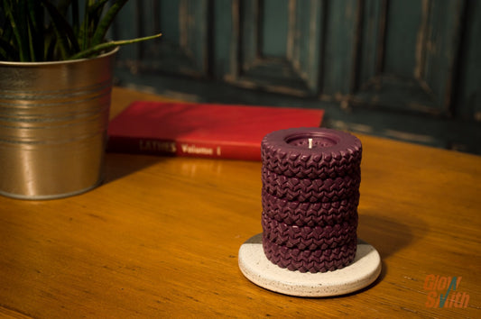 Wild Pomegranate Tyre Stack candle displayed in a lounge – statement piece, automotive-inspired décor, masculine scented candle